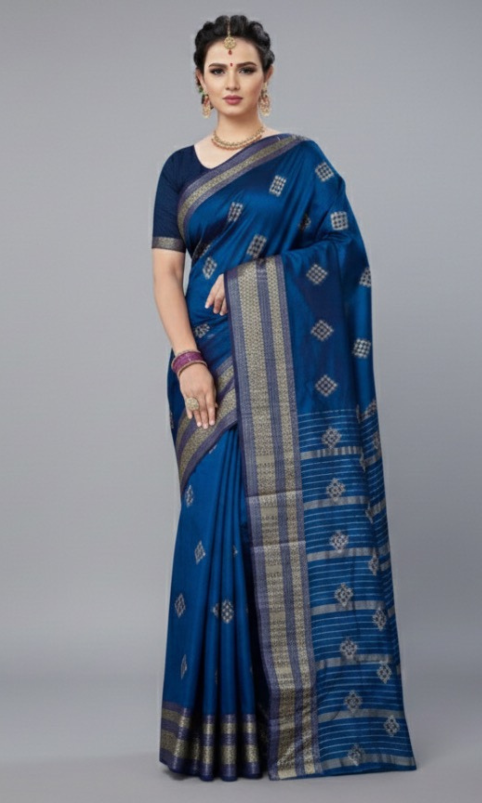 Rich Royal Blue saree with sophisticated silver zari border and woven motifs.