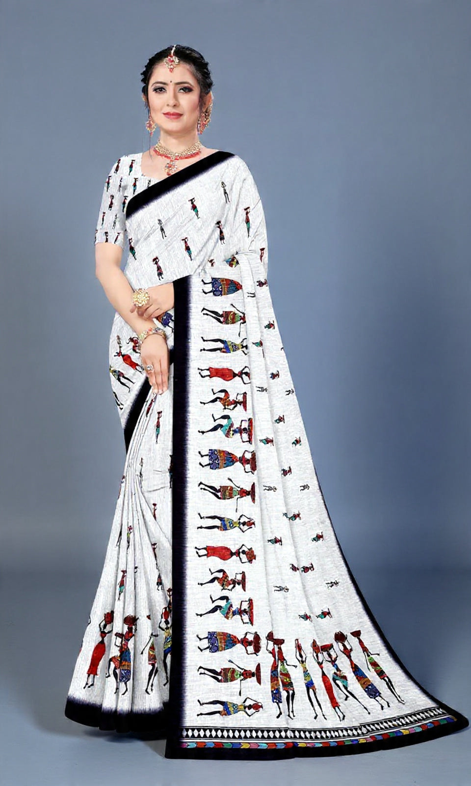 Handcrafted White Linen Saree with Tribal Ethnic Motifs