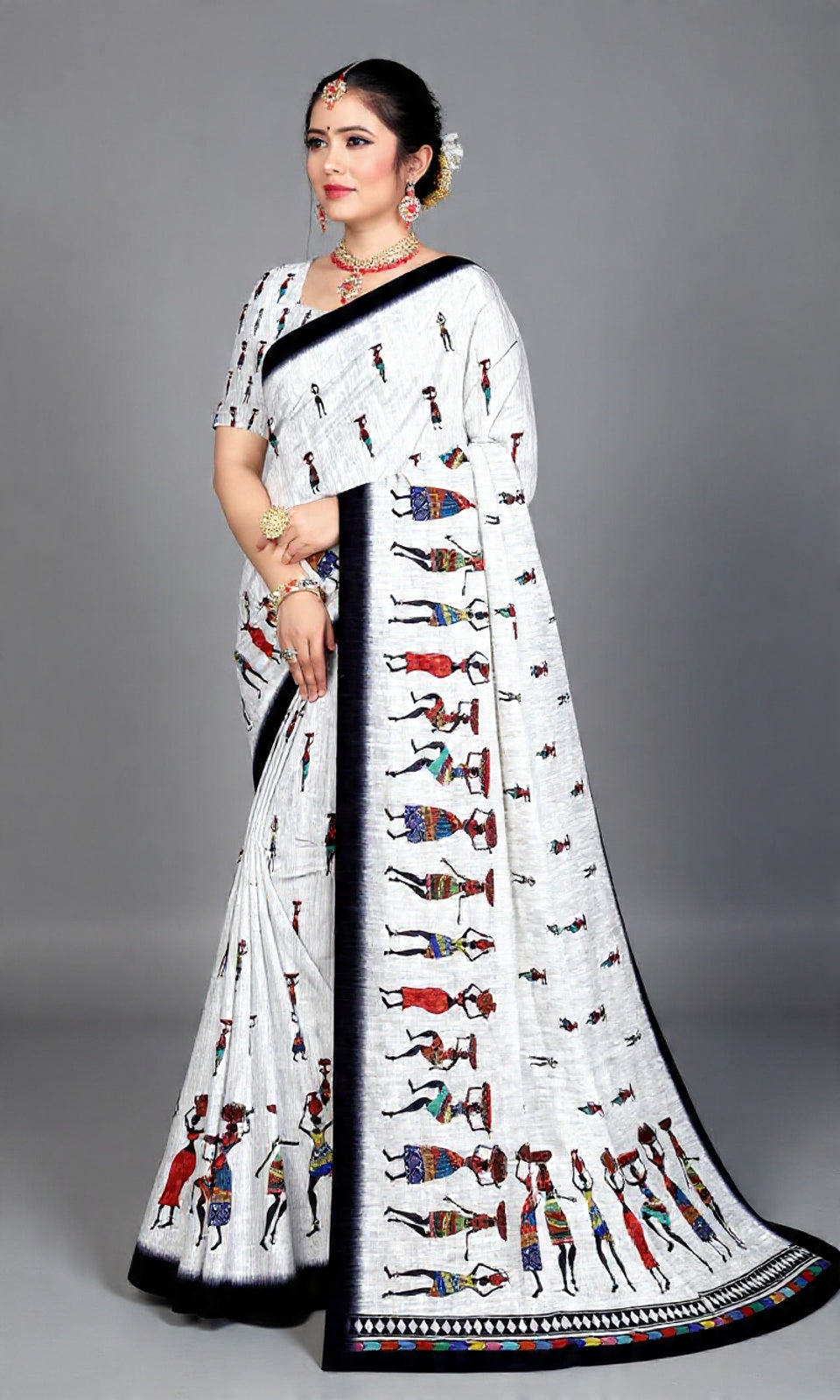 Handcrafted White Linen Saree with Tribal Ethnic Motifs